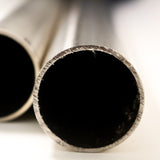 Two 304 stainless steel round tubes cut to length showing satin polished finish on white background