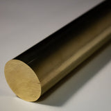 Single brass round bar cut to length showing end face and mill finish