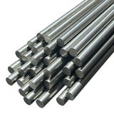 Multiple lengths of stainless steel round bar cut to size on white background