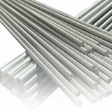 Two bundles of stainless steel round bar at an angle showing range of available diameters