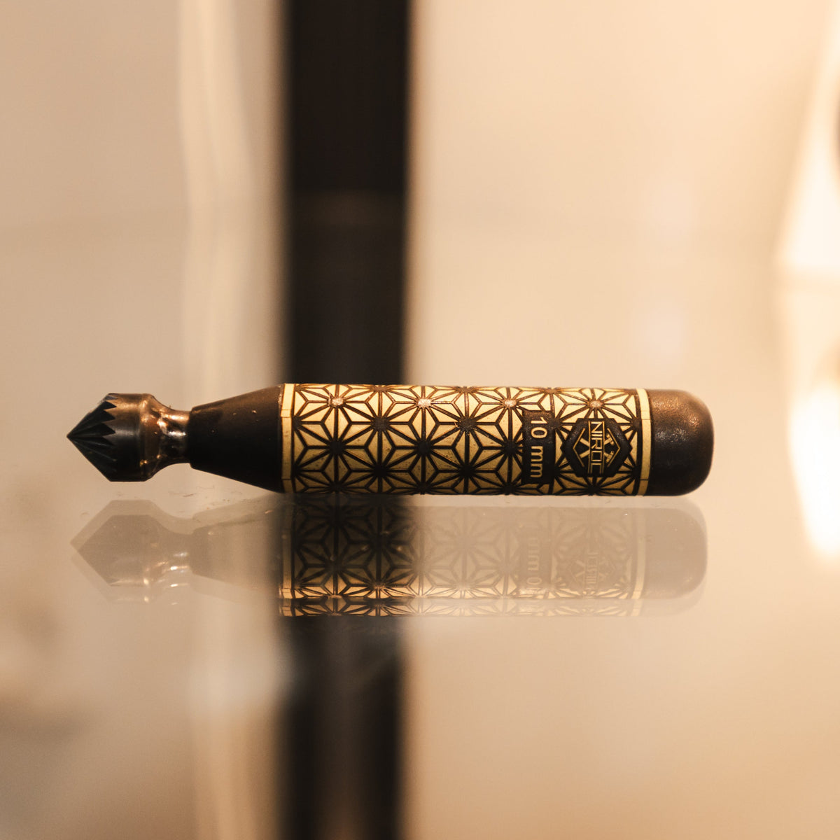 the 10mm blackened brass deburring tool from Niroc