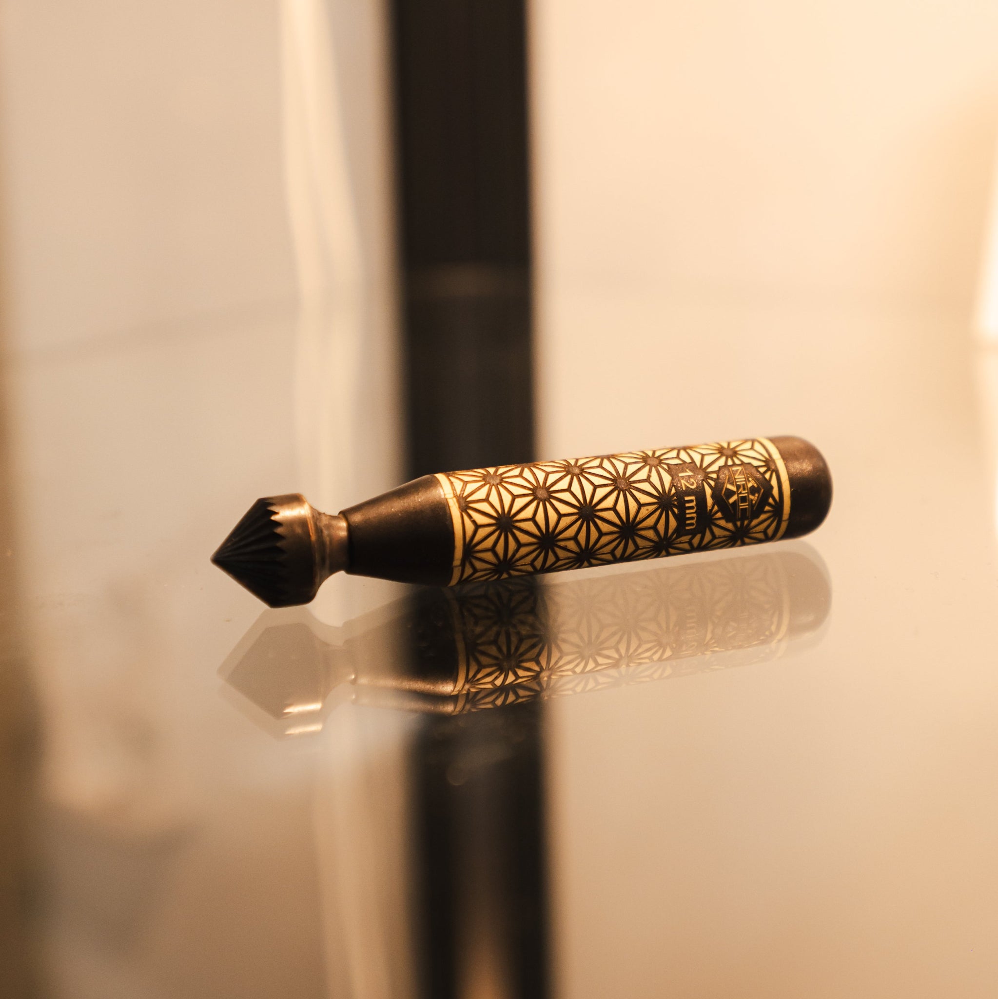 12mm brass deburr with a blackened brass with Kumiko pattern 