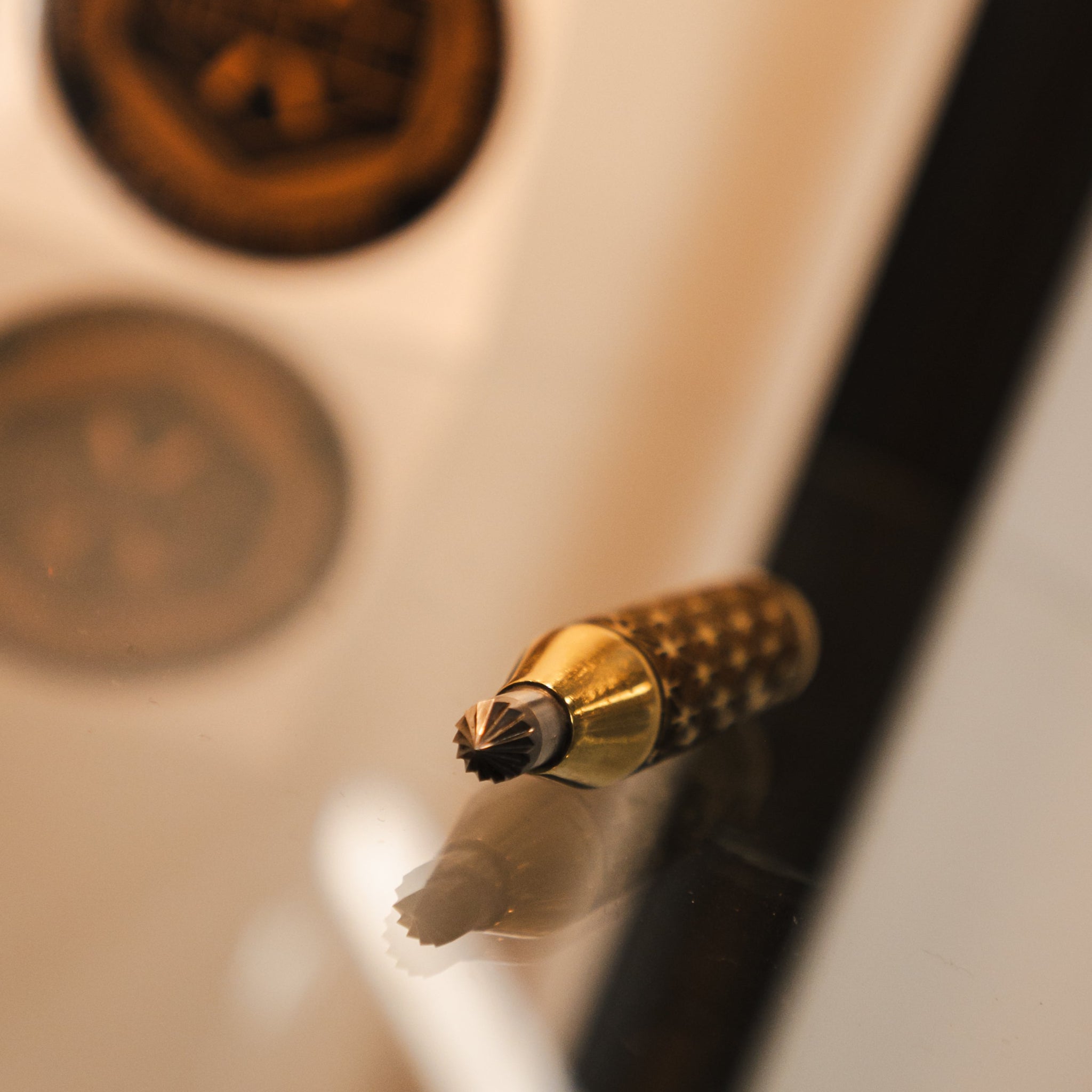 the brass showcasing the gold look it has when polished on this 6mm deburring tool
