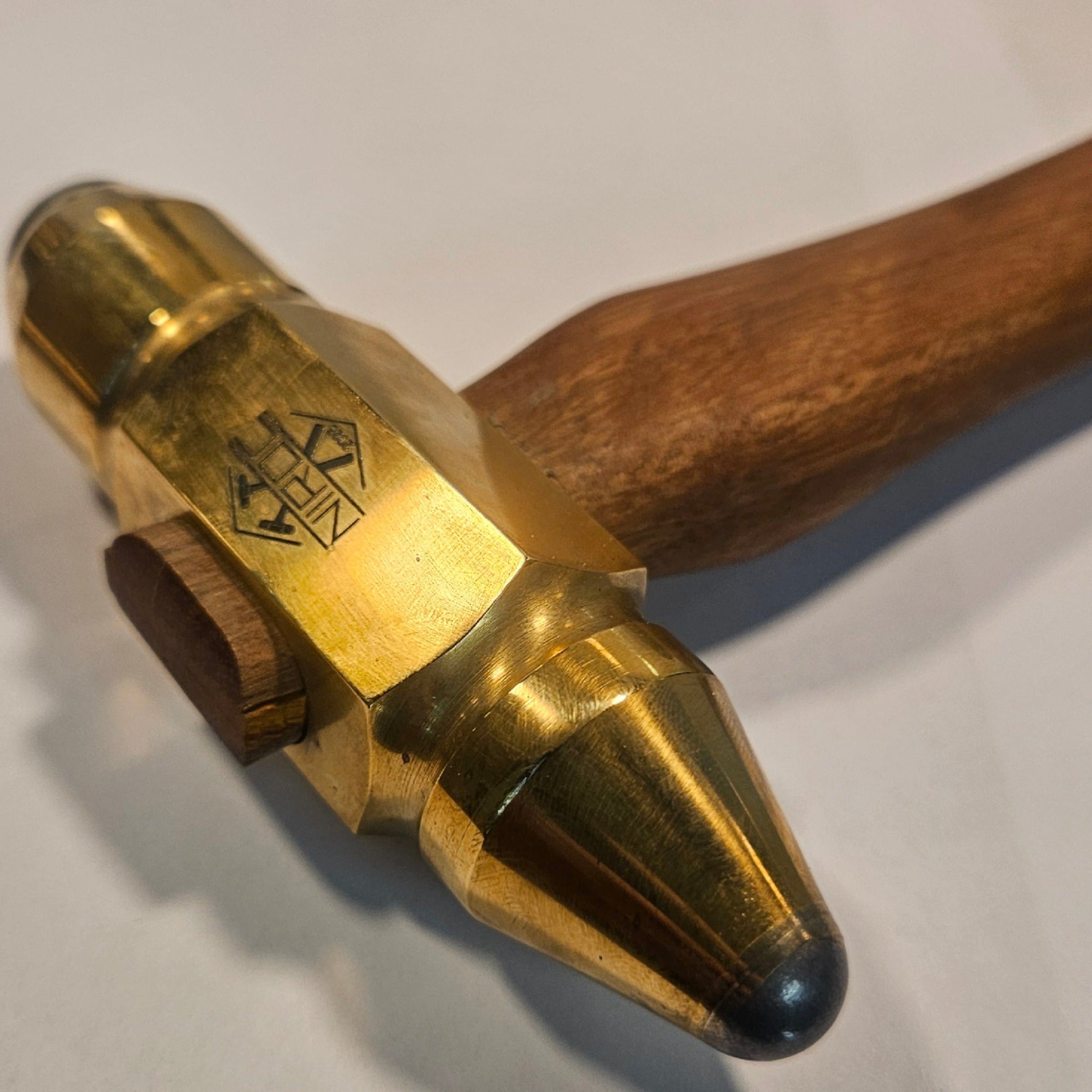 large brass head hammer with a 14mm and 22mm tungsten carbide ball