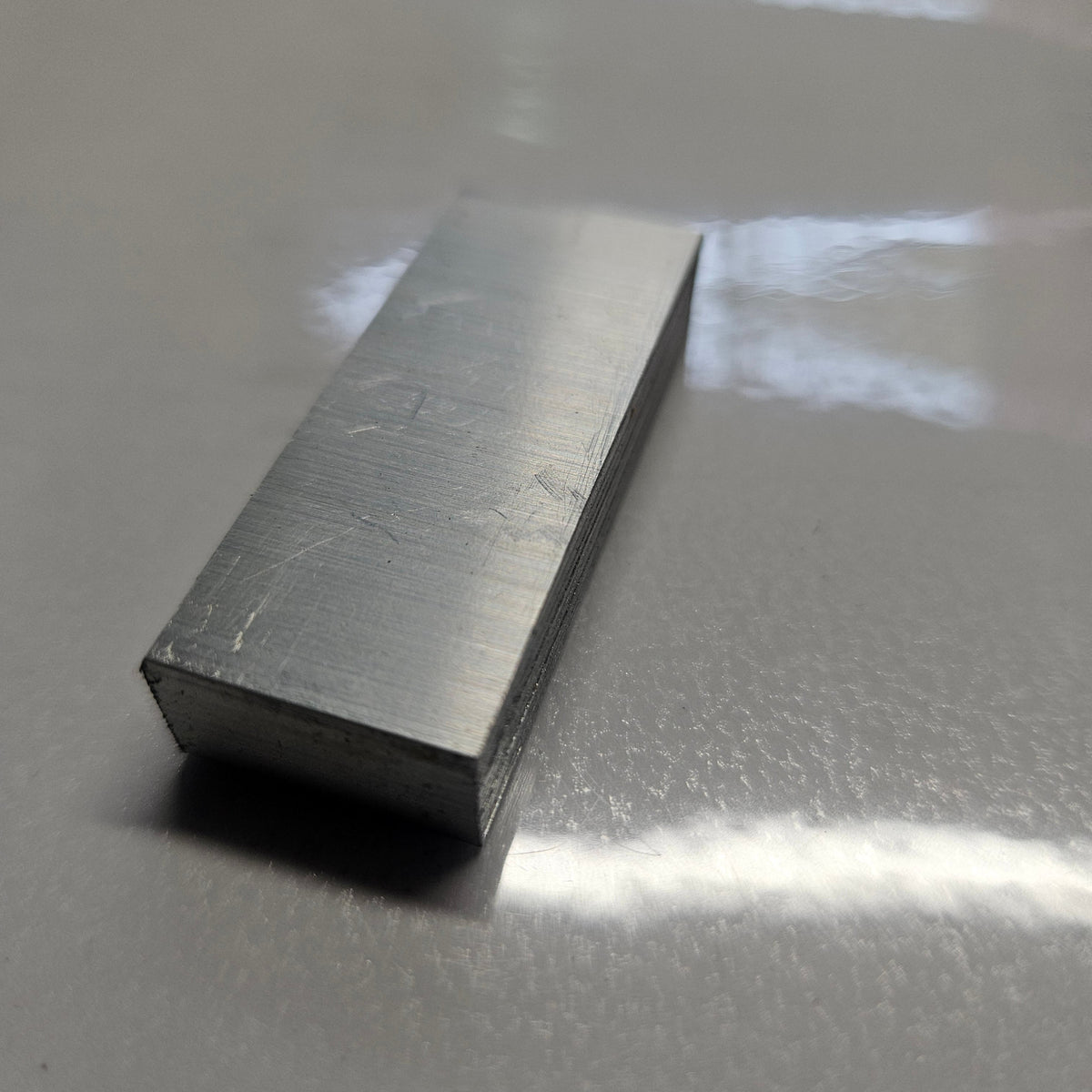 aluminium flat bar photo'd on a white background