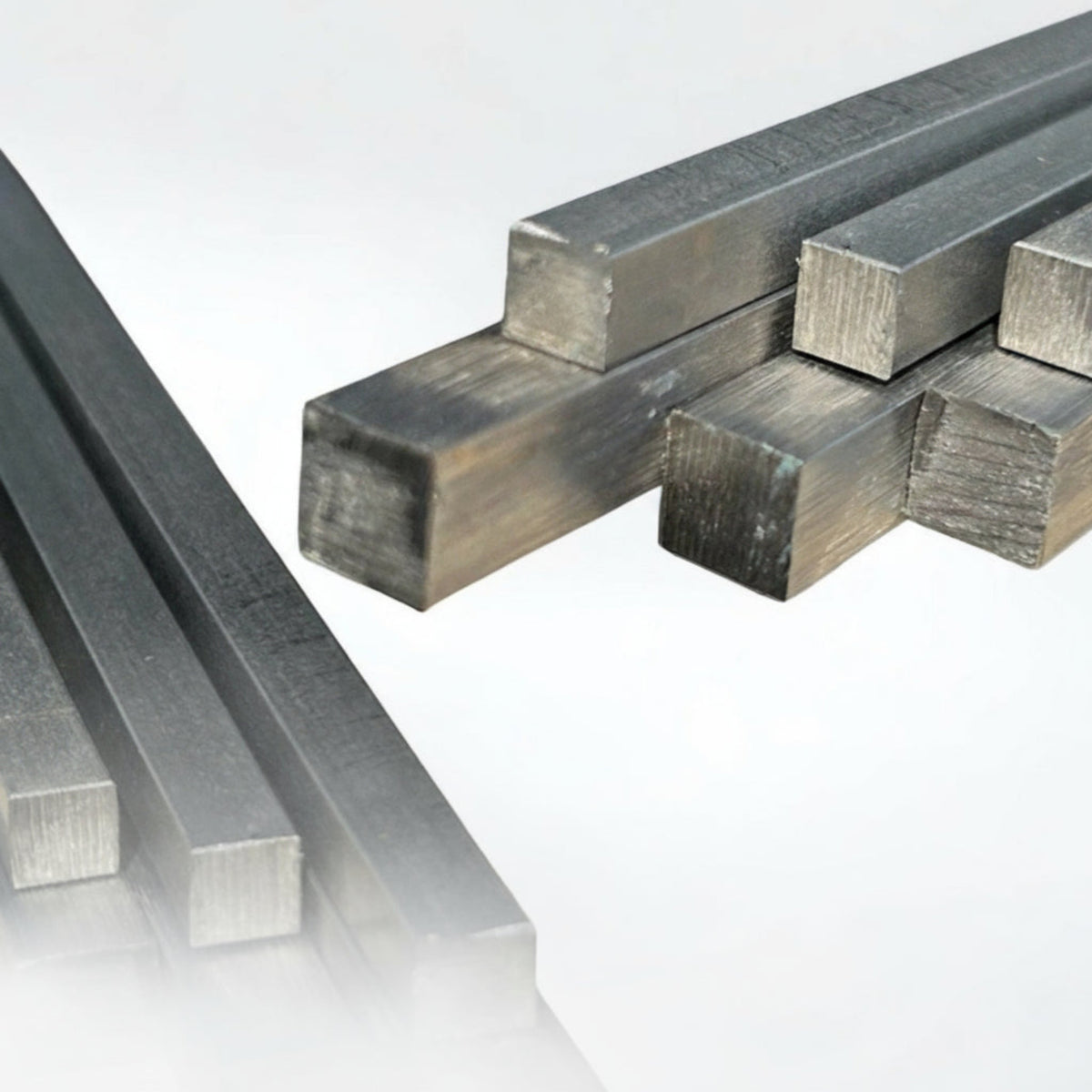 Stainless square bars on a white background