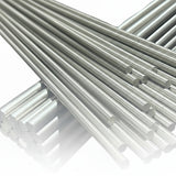 2 large bundles of stainless steel rod round bar at an angle